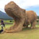 Illustration for article titled Straw Dinosaurs Appear in Japanese Fields, Try To Eat Humans